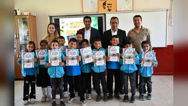 Kaymakam Aslantatar, karne dağıtımında öğrencilere başarı ve kitap okuma tavsiyesi verdi